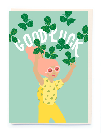 Good Luck card by Noi. Features a Girl and good luck clovers and ‘Good luck’ message on the front.