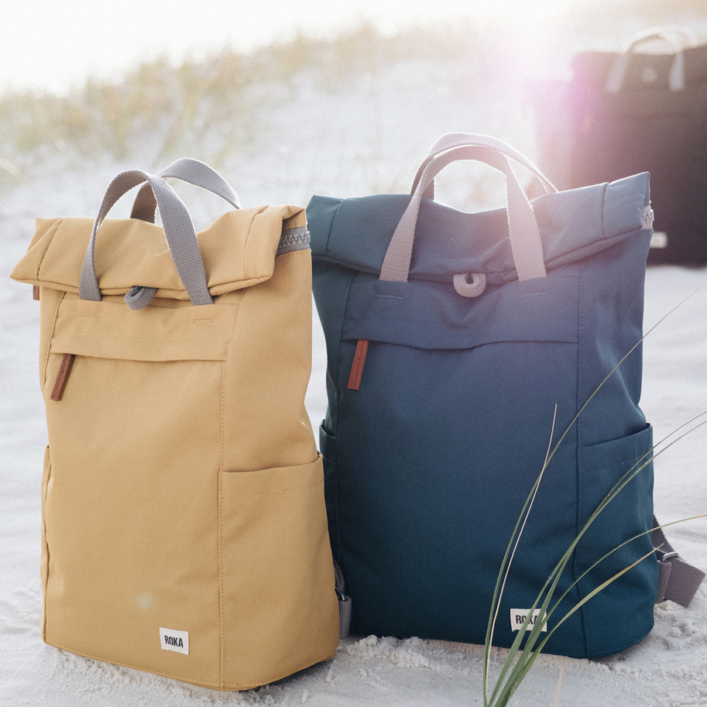 finchley sustainable bags on sand dune by roka
