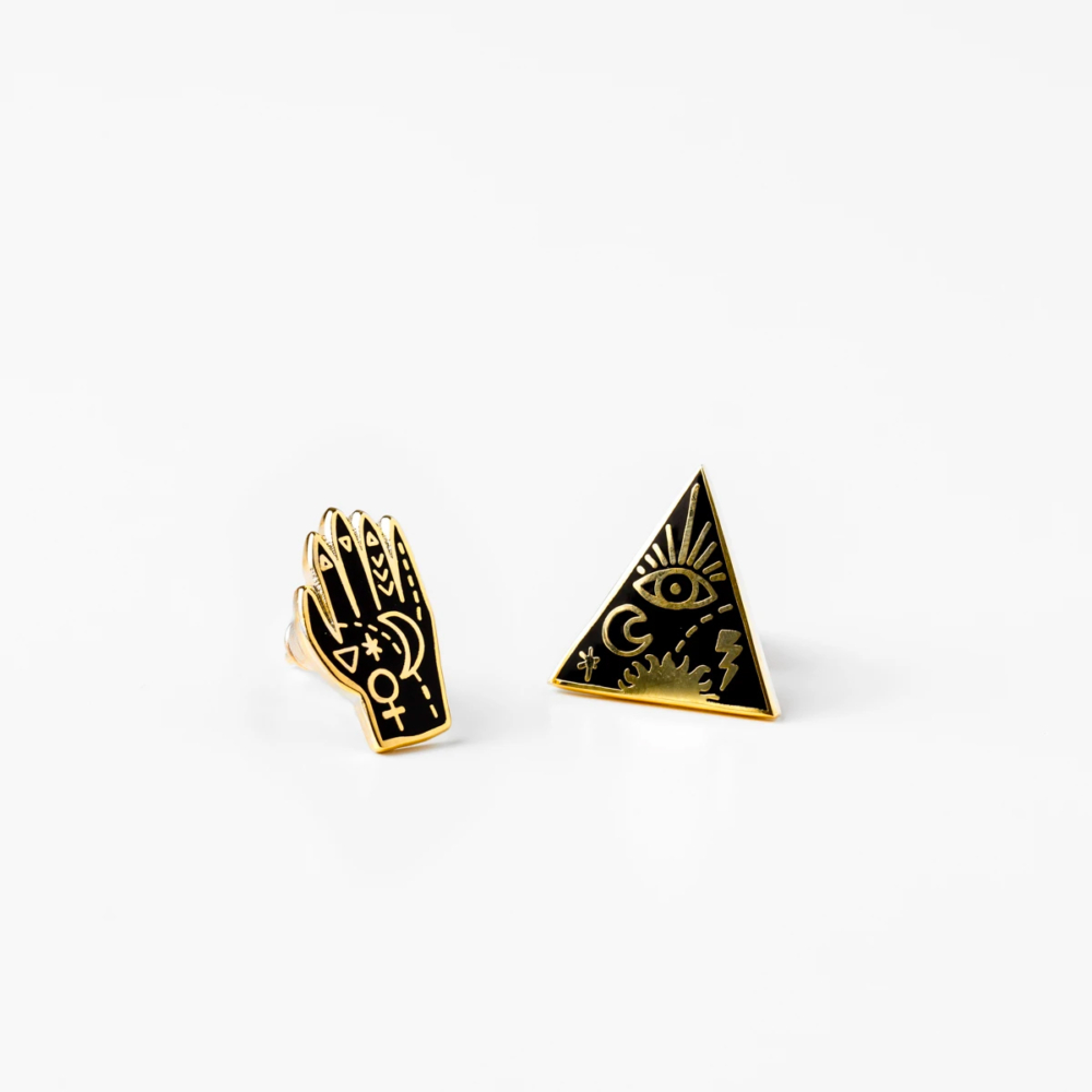 Mis-matched earrings mystic hands by YOW