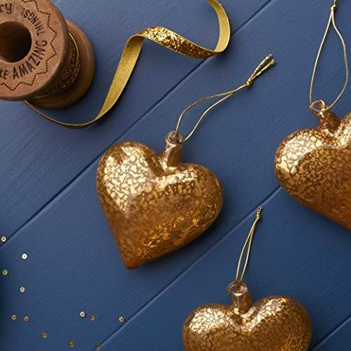 gold heart bauble by gisela brown