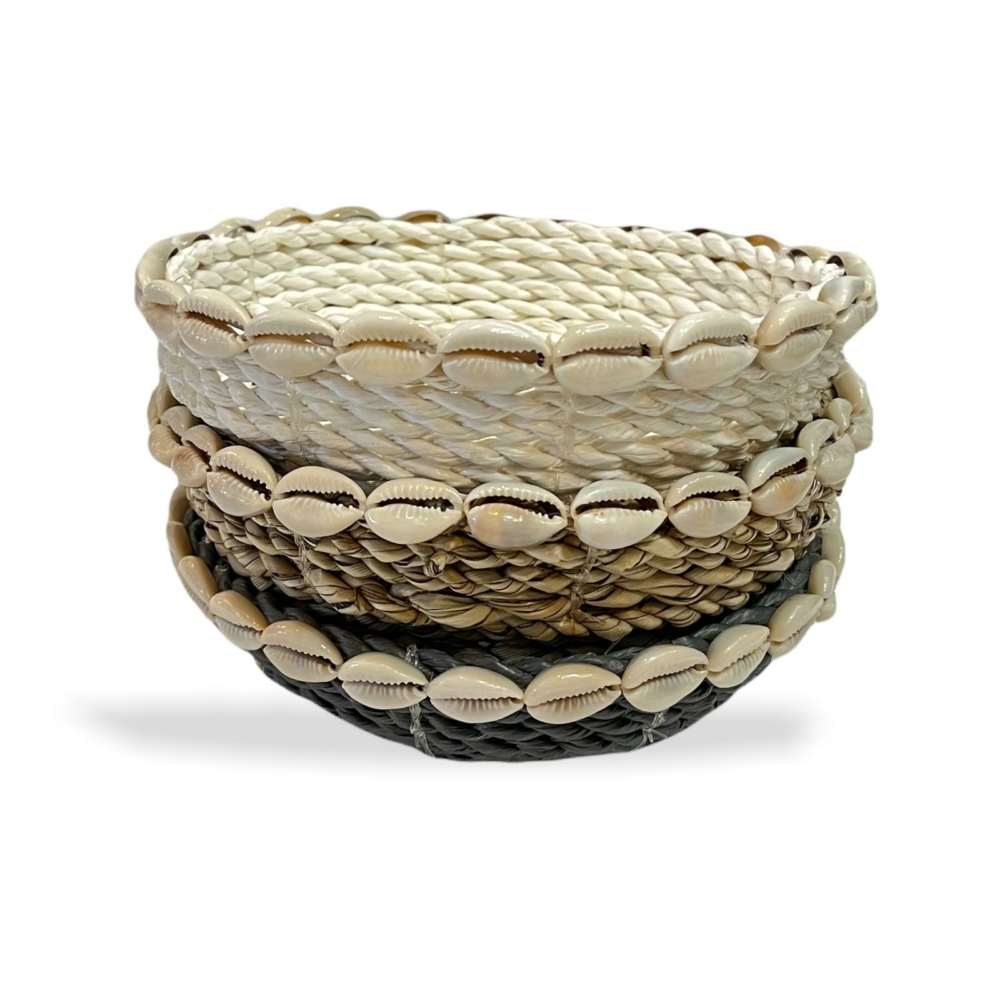 small wicker basket with shells collection