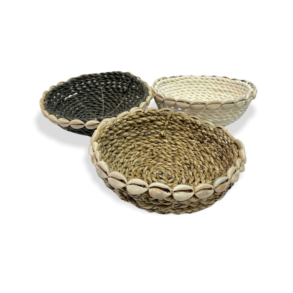small wicker basket with shells collection