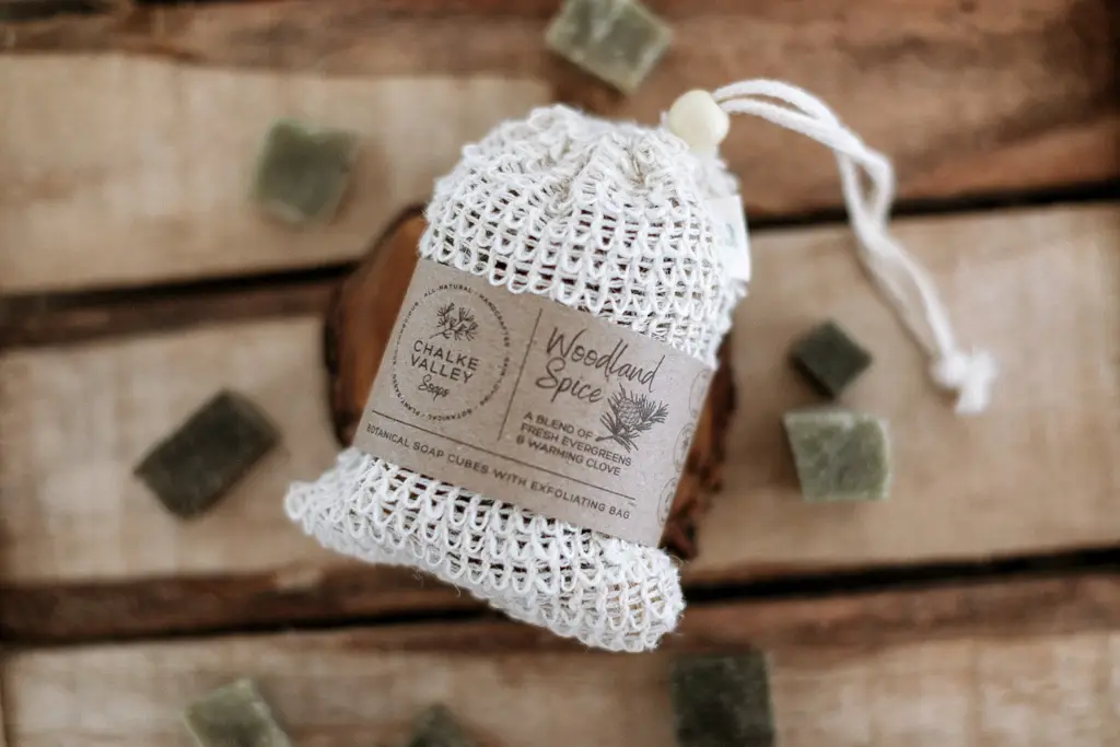botanical soap cubes in an exfoliating bag woodland spice by Chalke Valley Soaps