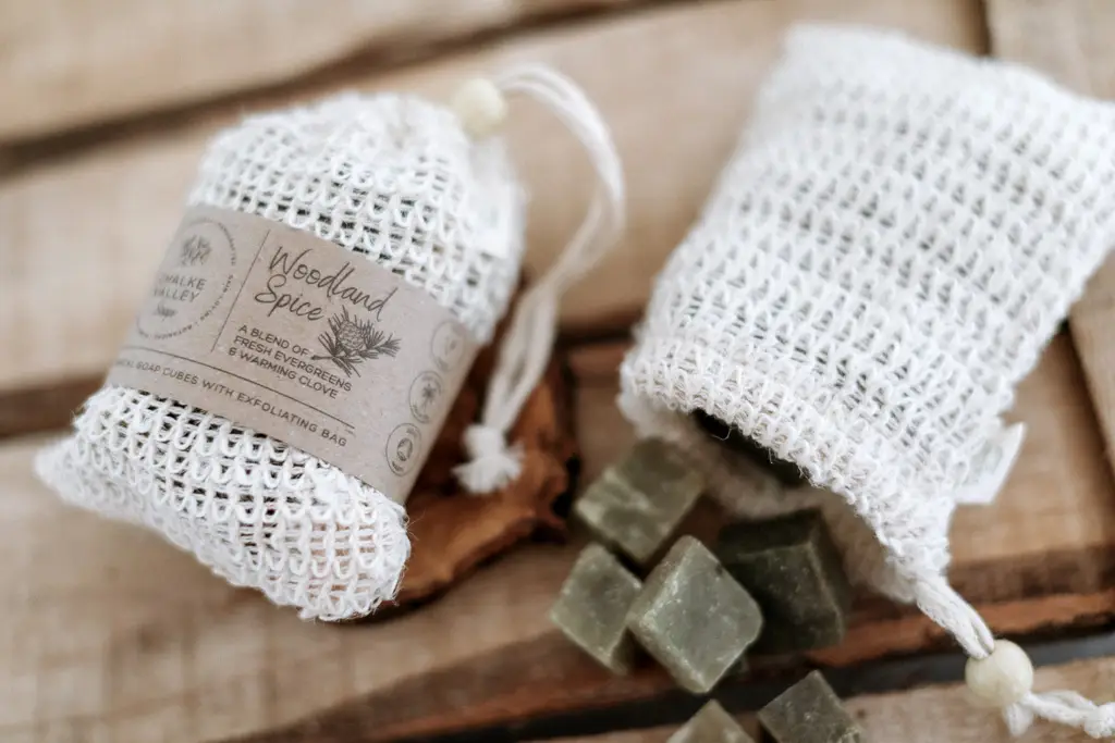 botanical soap cubes in an exfoliating bag woodland spice by Chalke Valley Soaps
