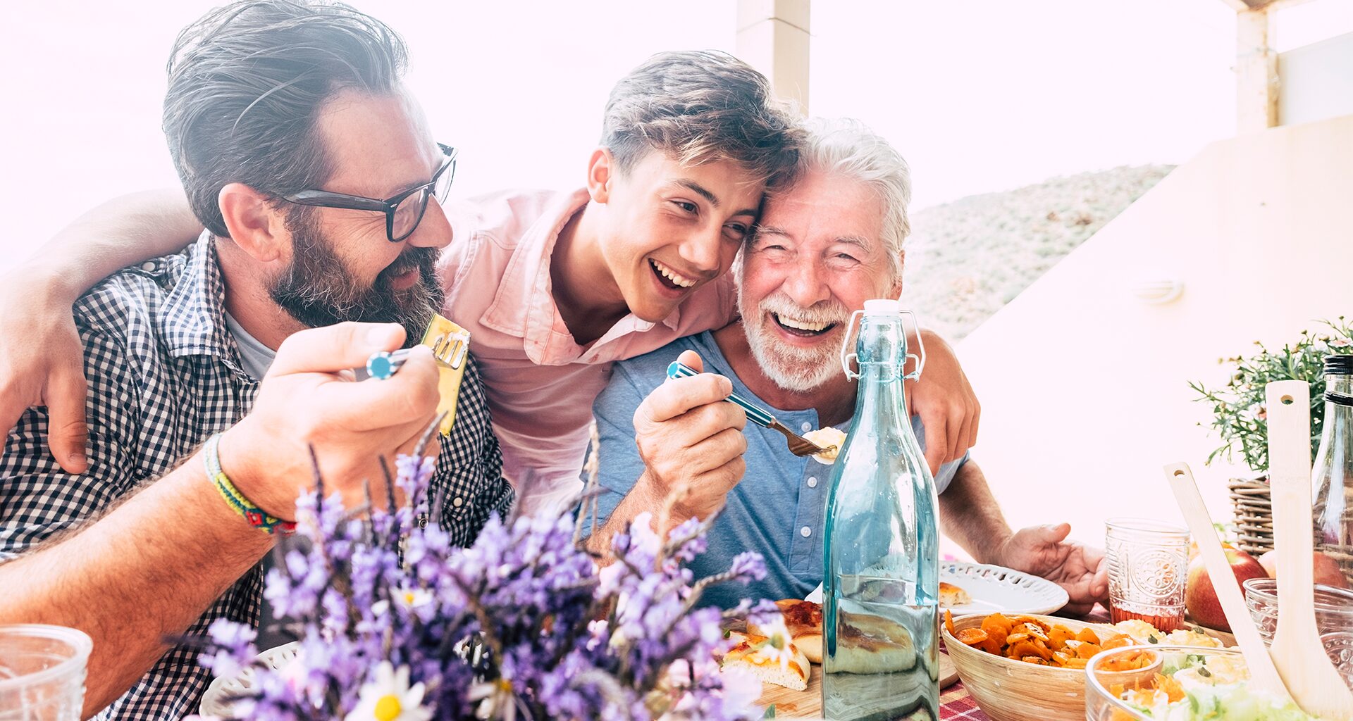 Three generations photo of men eating, father's day blog by Cadeau